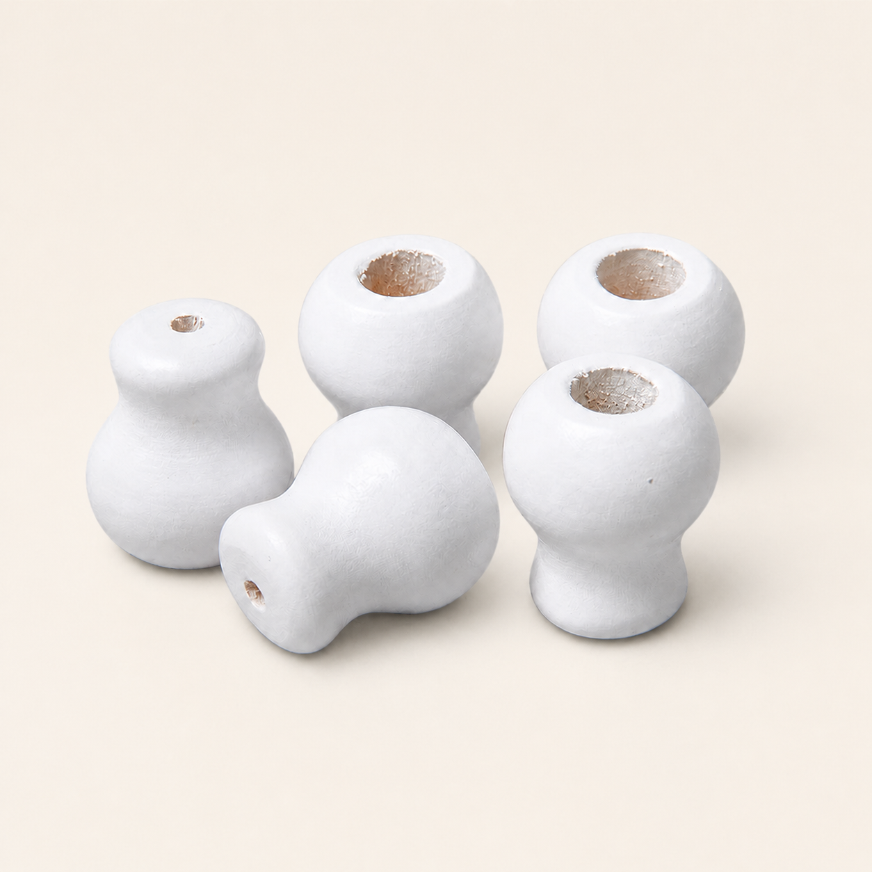 White bell-shaped Roman blind wooden acorns